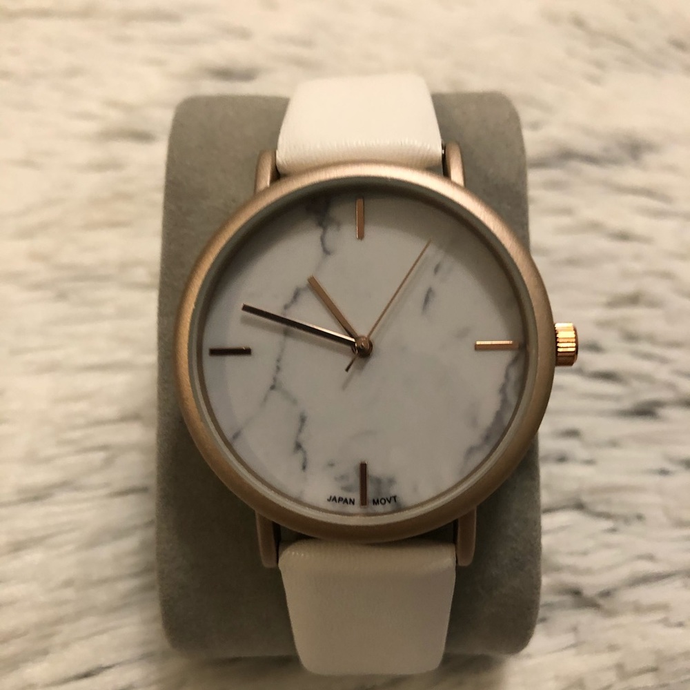 White marble face rose gold and white watch